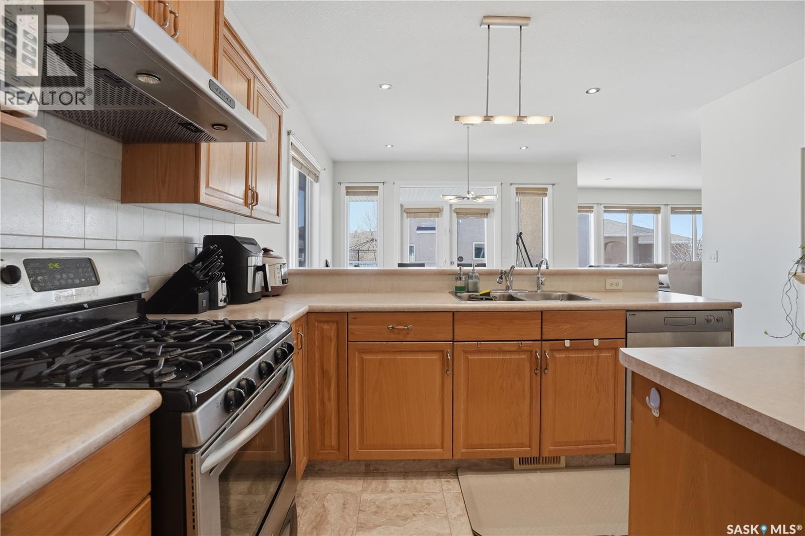 3714 Sandringham Road E, Regina, SK - Indoor Photo Showing Kitchen With Double Sink