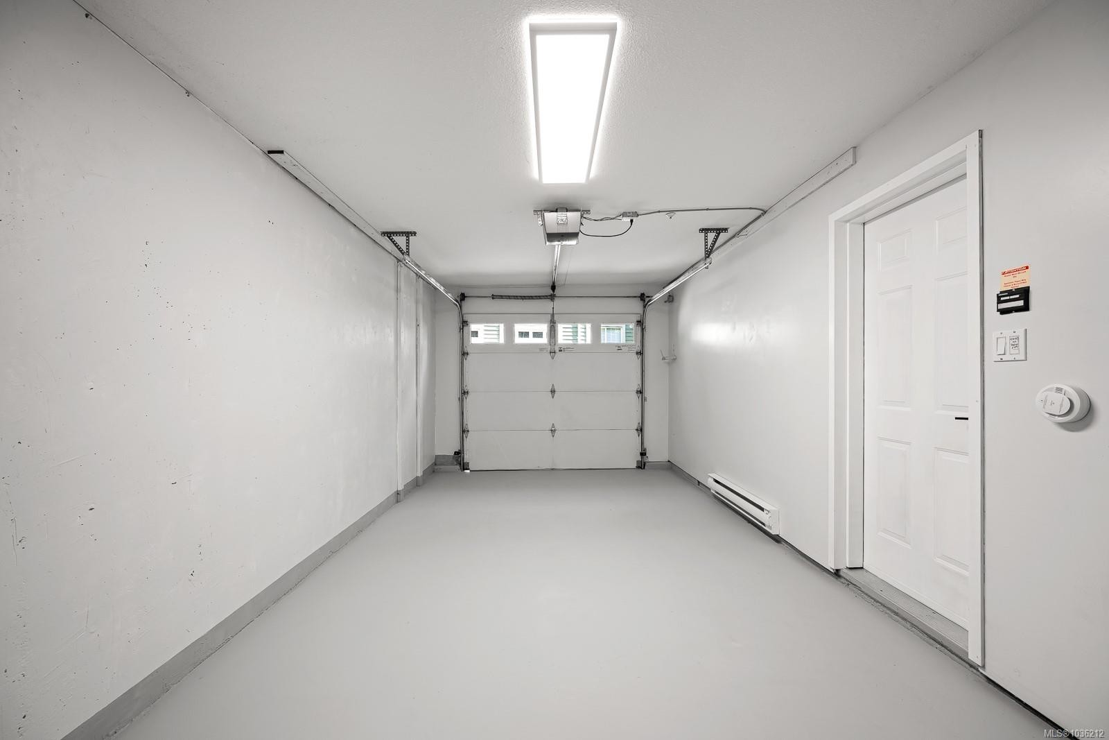 202-2275 Comox Ave, Comox, BC - Indoor Photo Showing Garage