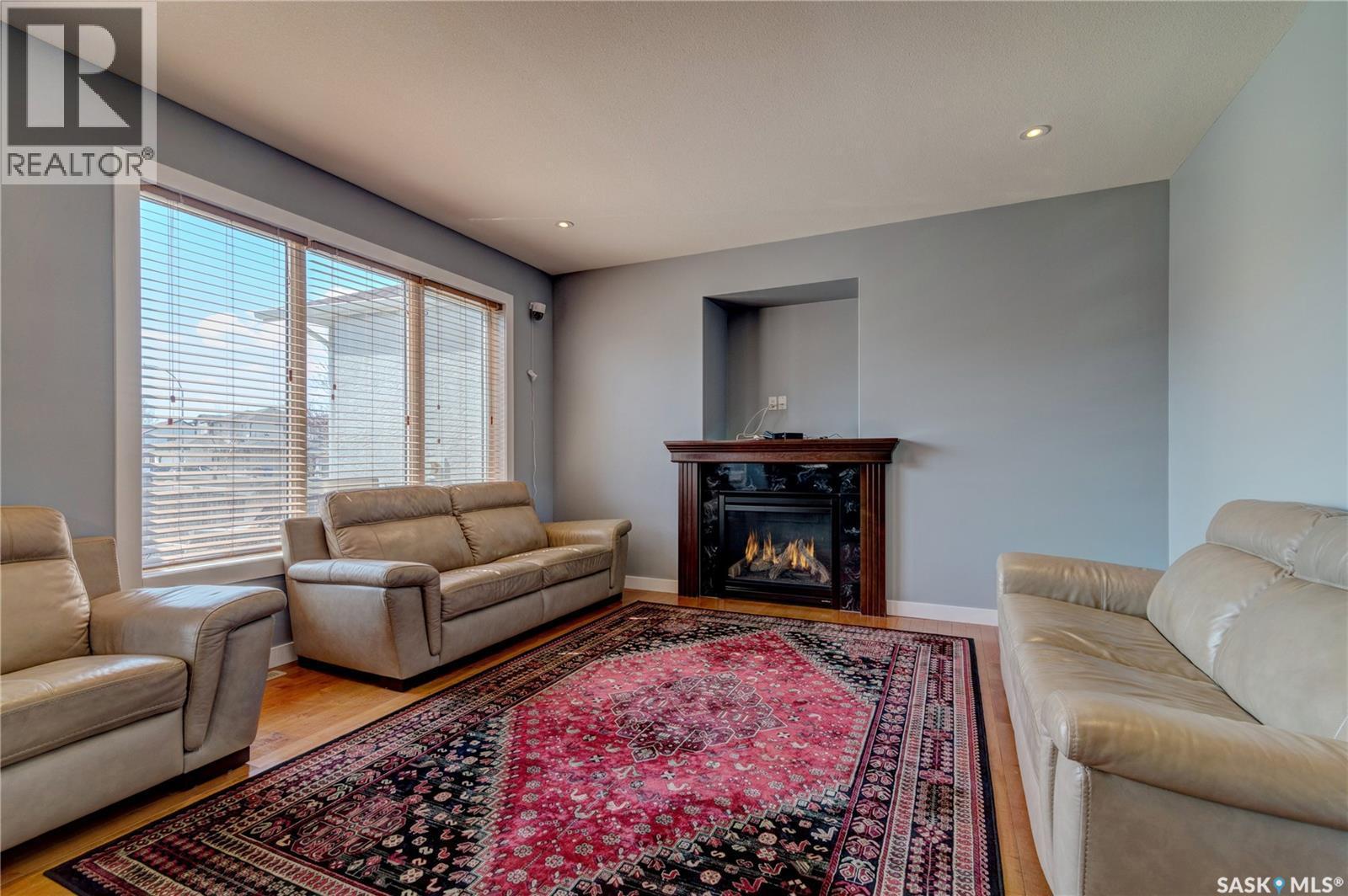 4003 Lepine Road, Regina, SK - Indoor Photo Showing Living Room With Fireplace