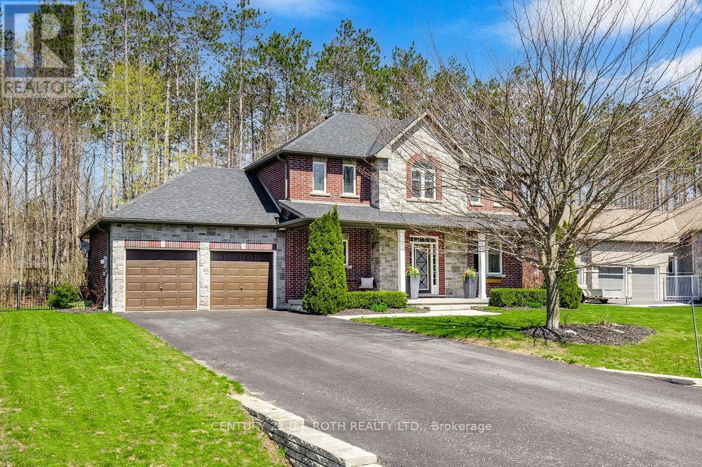 12 Lloyd Cook Drive E, Springwater, ON - Outdoor With Facade