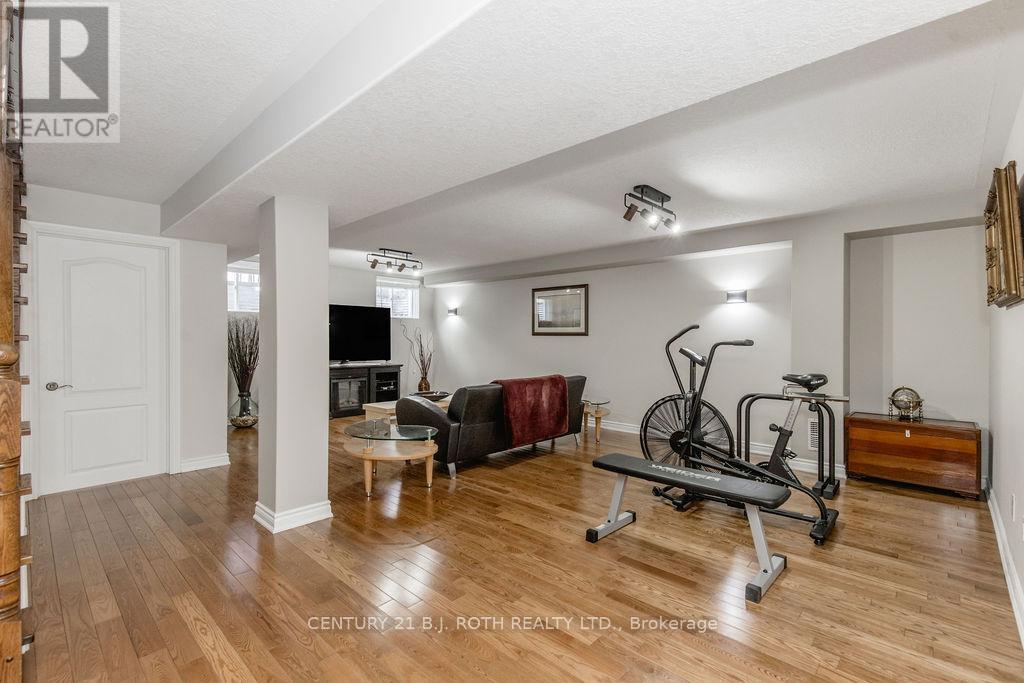 12 Lloyd Cook Drive E, Springwater, ON - Indoor Photo Showing Gym Room