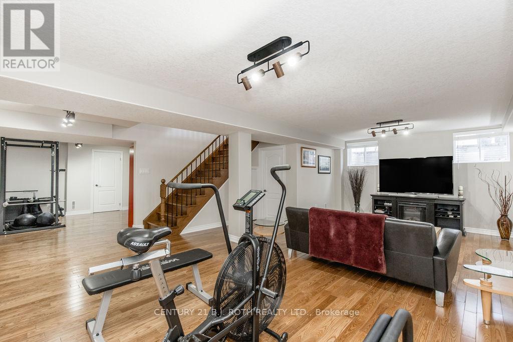 12 Lloyd Cook Drive E, Springwater, ON - Indoor Photo Showing Gym Room