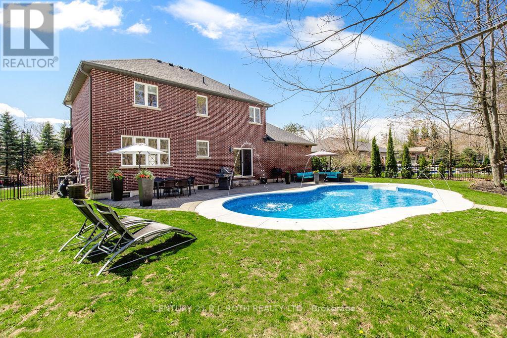 12 Lloyd Cook Drive E, Springwater, ON - Outdoor With In Ground Pool With Backyard