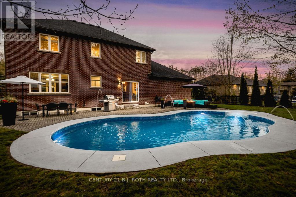 12 Lloyd Cook Drive E, Springwater, ON - Outdoor With In Ground Pool