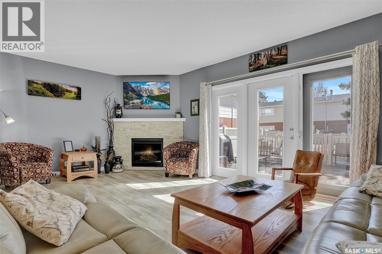 194 Plainsview Drive, Regina, SK - Indoor Photo Showing Living Room With Fireplace