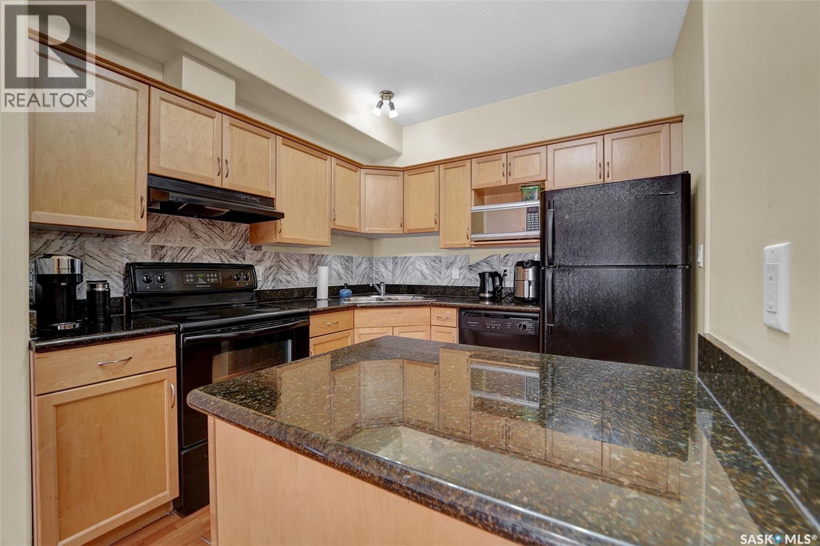 307 333 Nelson Road, Saskatoon, SK - Indoor Photo Showing Kitchen With Double Sink