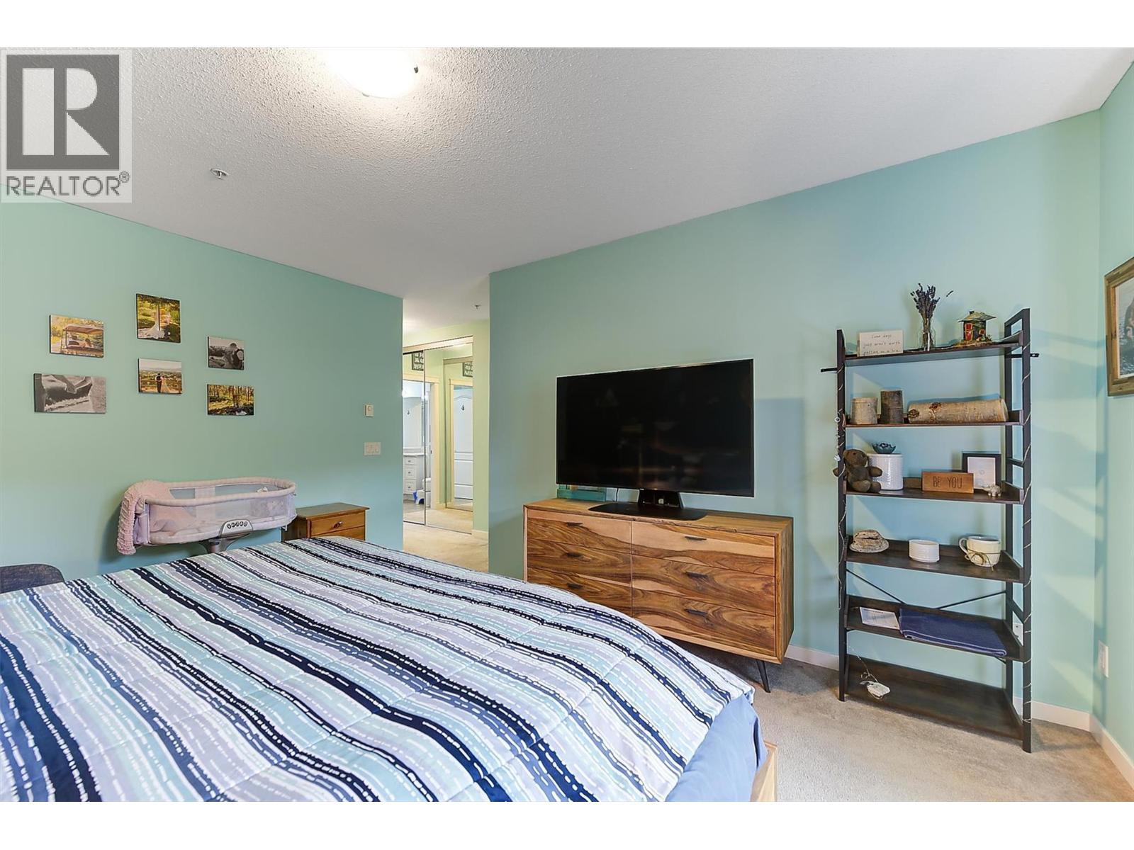 307 Whitman Road Unit# 206, Kelowna, BC - Indoor Photo Showing Bedroom