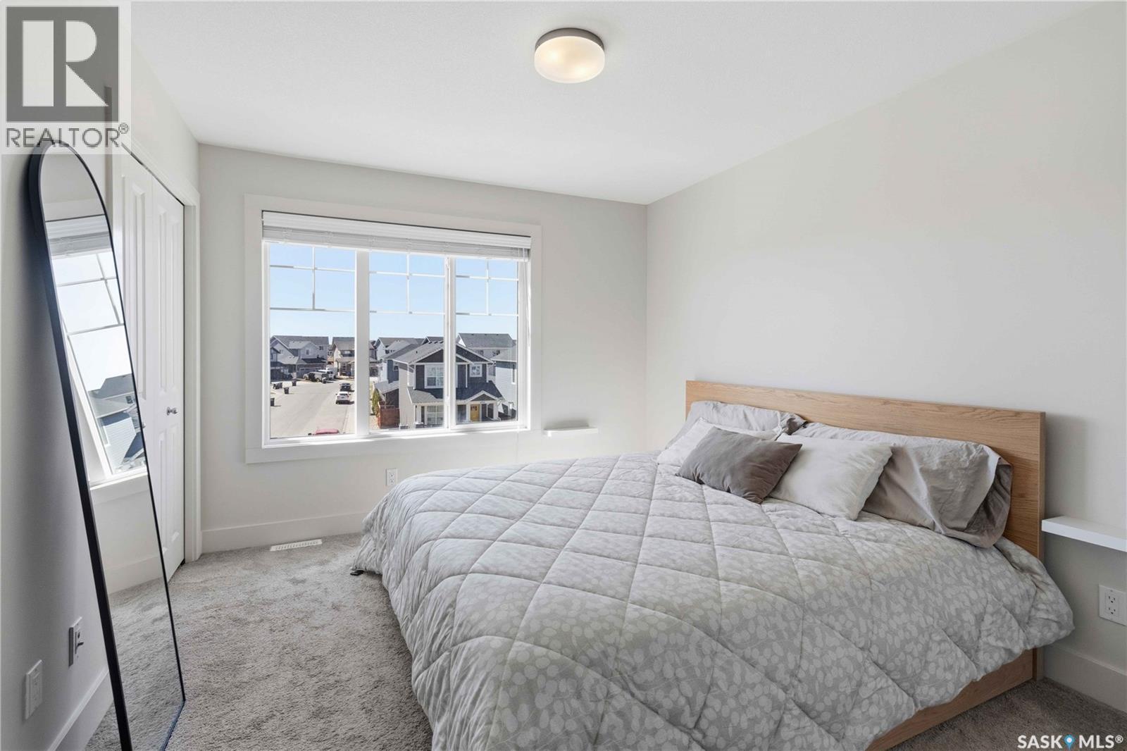 711 Meadows Boulevard, Saskatoon, SK - Indoor Photo Showing Bedroom