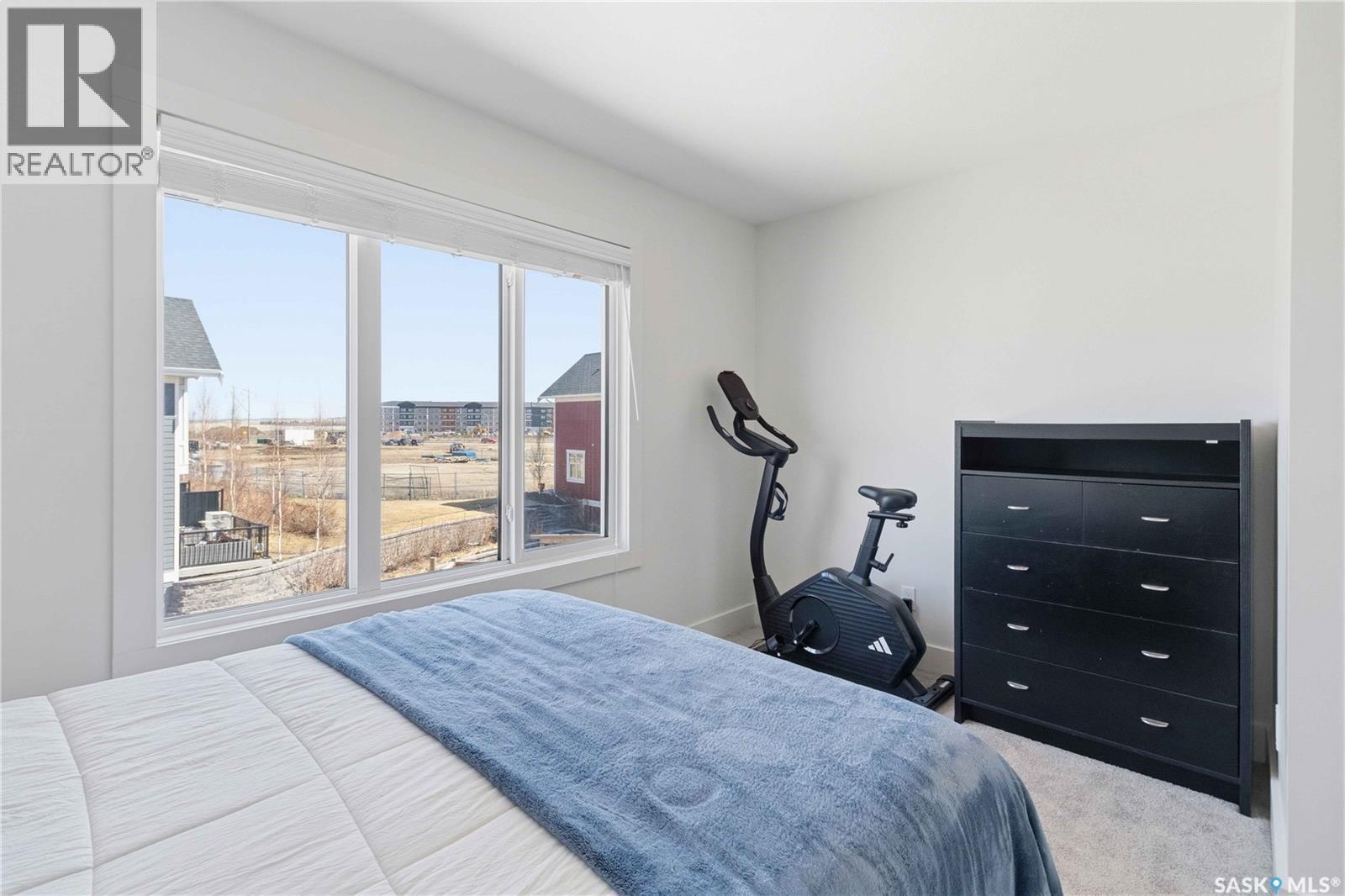 711 Meadows Boulevard, Saskatoon, SK - Indoor Photo Showing Bedroom