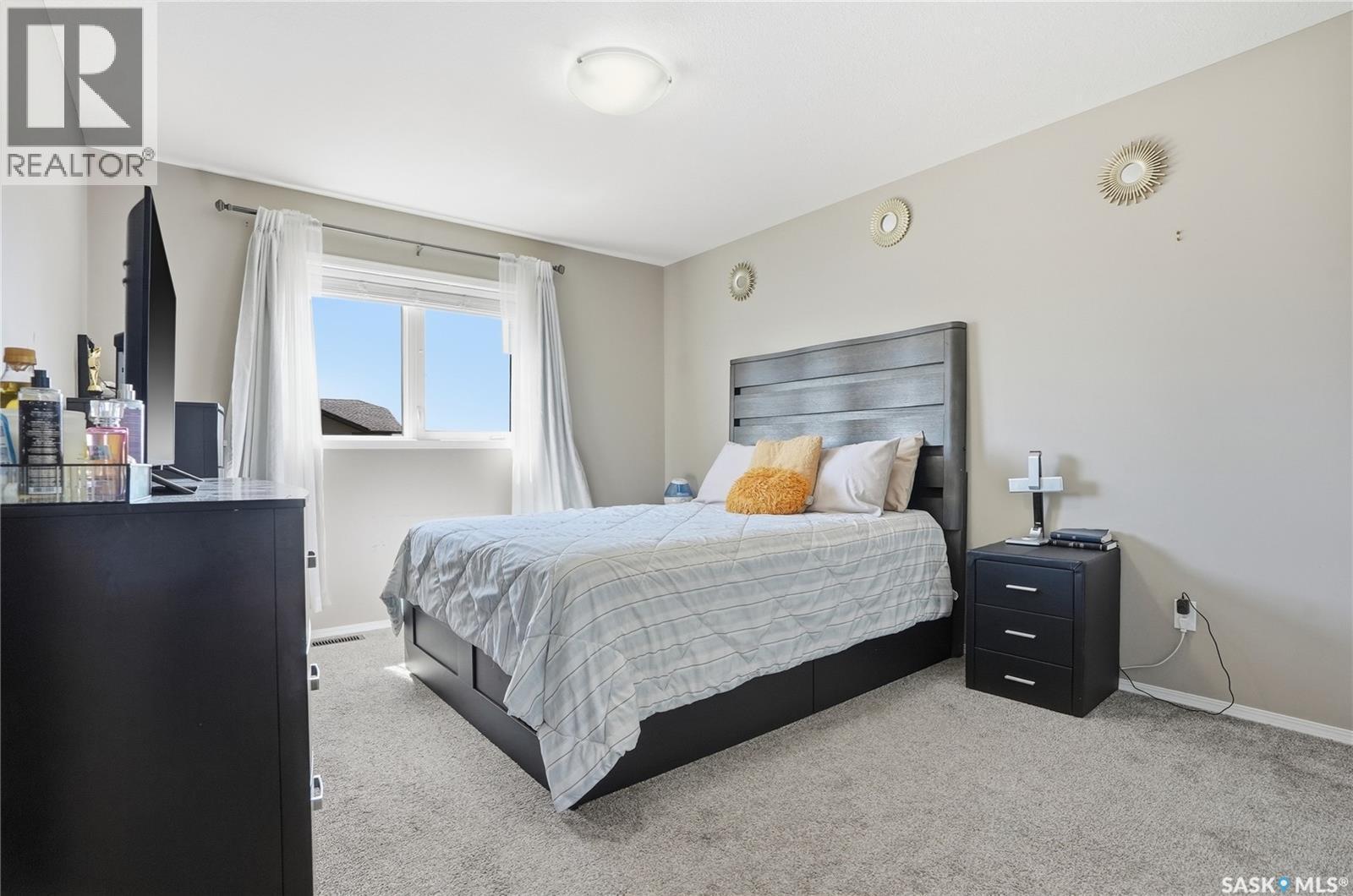 20 515 Centennial Drive, Warman, SK - Indoor Photo Showing Bedroom