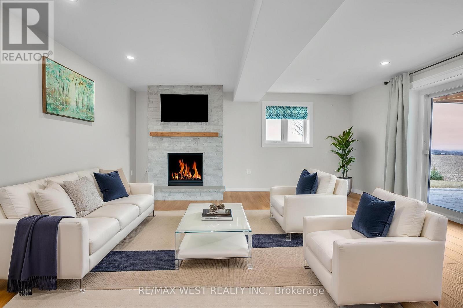 2219 County Road 42, Clearview, ON - Indoor Photo Showing Living Room With Fireplace