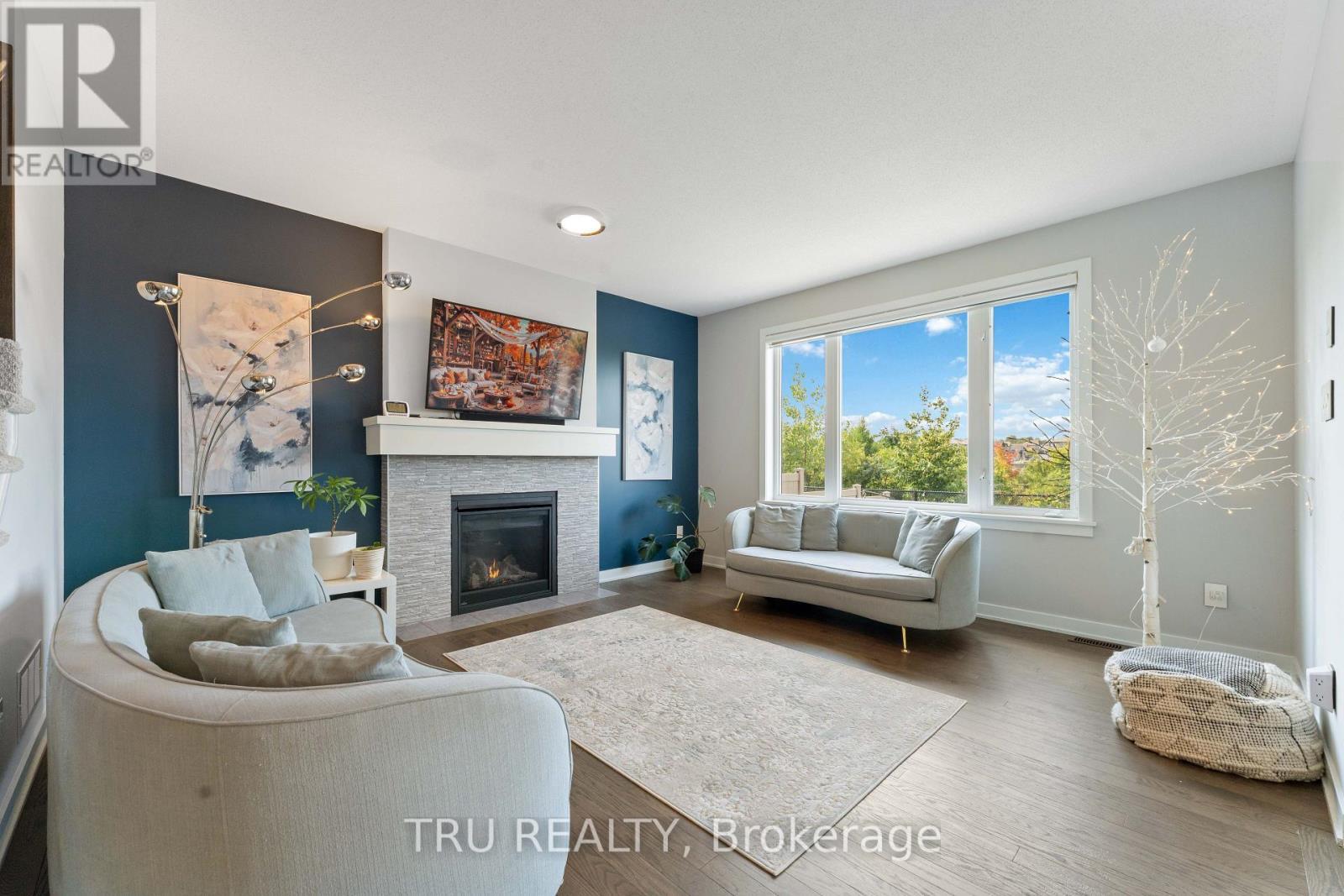 43 Aridus Crescent, Ottawa, ON - Indoor Photo Showing Living Room With Fireplace