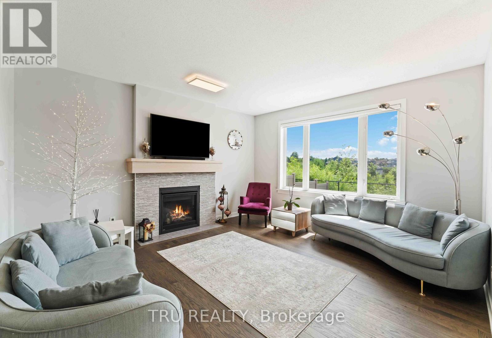 43 Aridus Crescent, Ottawa, ON - Indoor Photo Showing Living Room With Fireplace