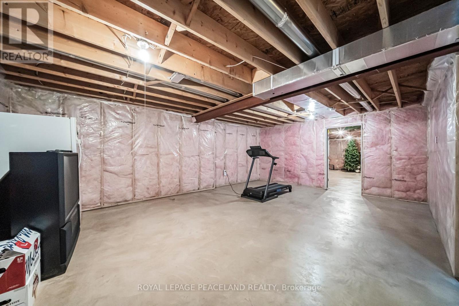 11 - 5595 Drummond Road, Niagara Falls, ON - Indoor Photo Showing Basement