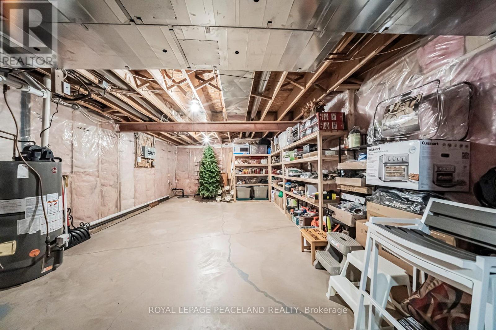 11 - 5595 Drummond Road, Niagara Falls, ON - Indoor Photo Showing Basement