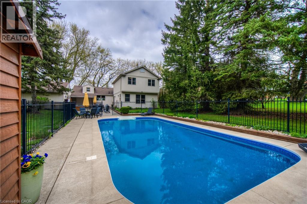 145 Riverbank Drive, Cambridge, ON - Outdoor With In Ground Pool With Backyard