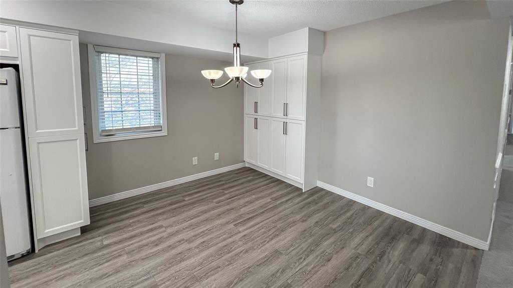 M-212-1520 Venetian Boulevard, Point Edward, ON - Indoor Photo Showing Other Room