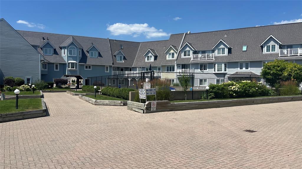 M-212-1520 Venetian Boulevard, Point Edward, ON - Outdoor With Facade