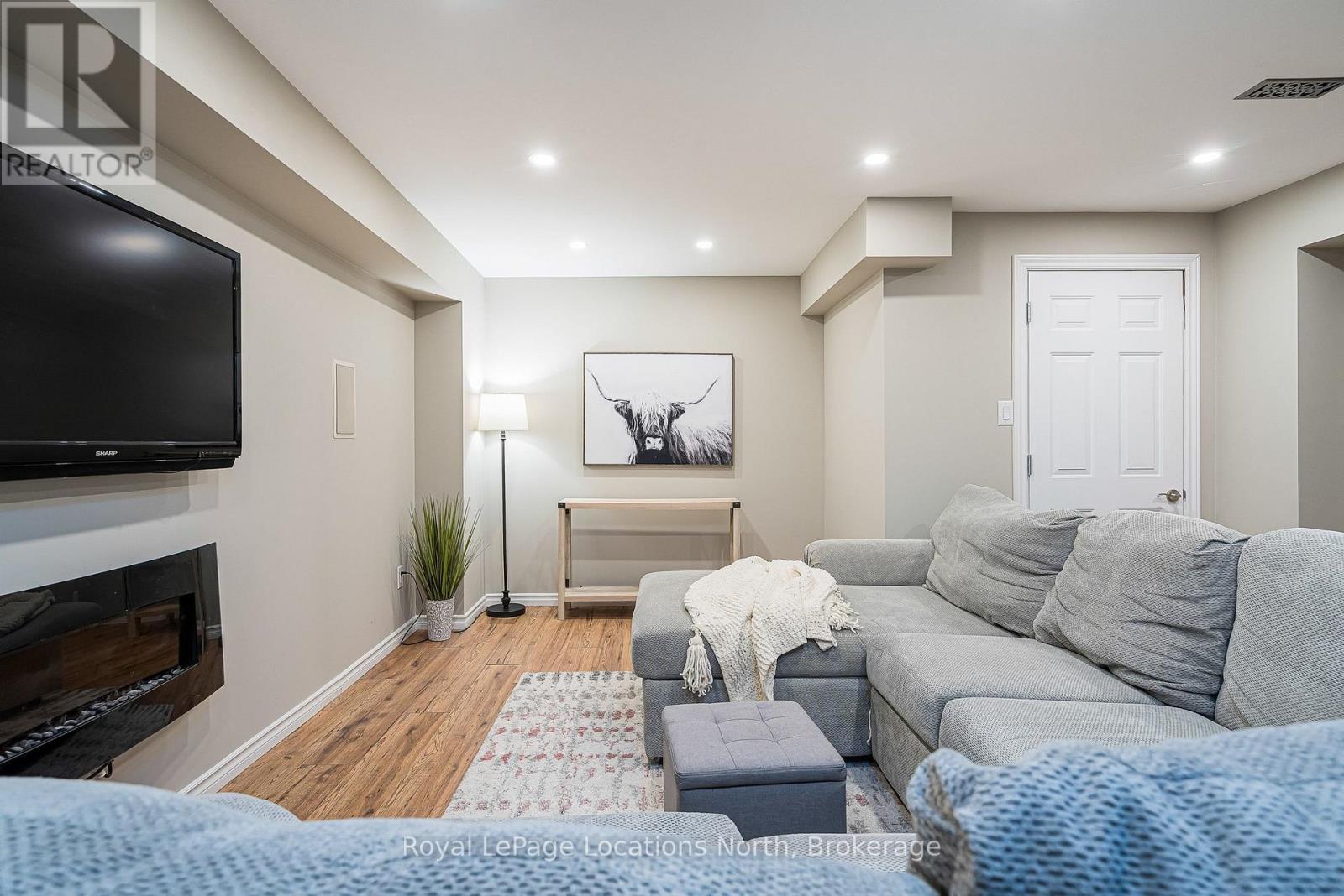 59 Kells Crescent, Collingwood, ON - Indoor Photo Showing Other Room With Fireplace