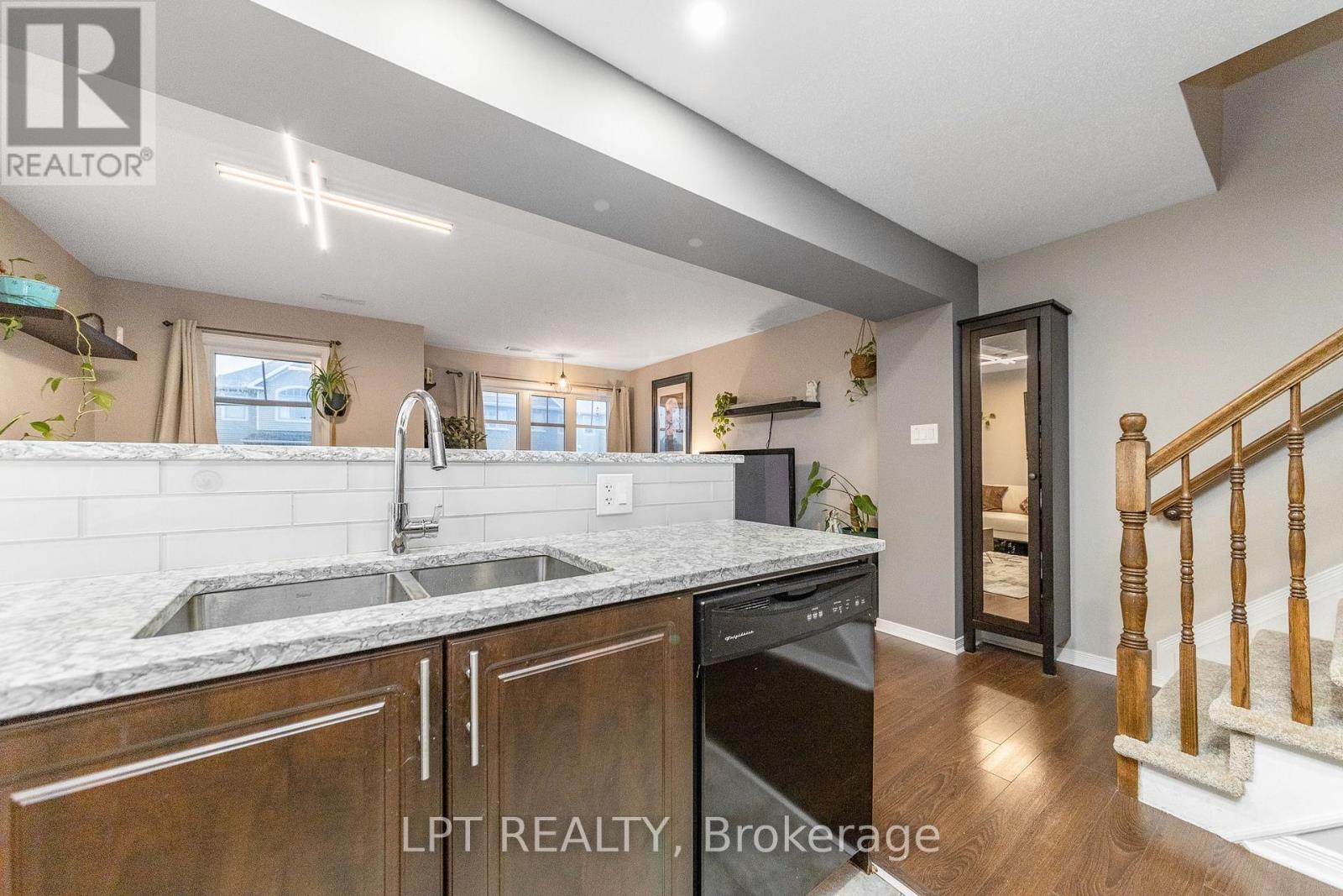 7 - 102 Windswept Private, Ottawa, ON - Indoor Photo Showing Kitchen With Double Sink