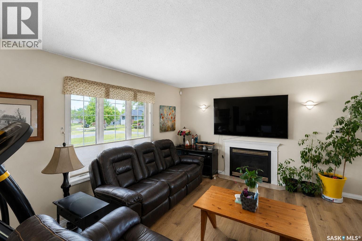 3 Meagher Place, Prince Albert, SK - Indoor Photo Showing Living Room With Fireplace