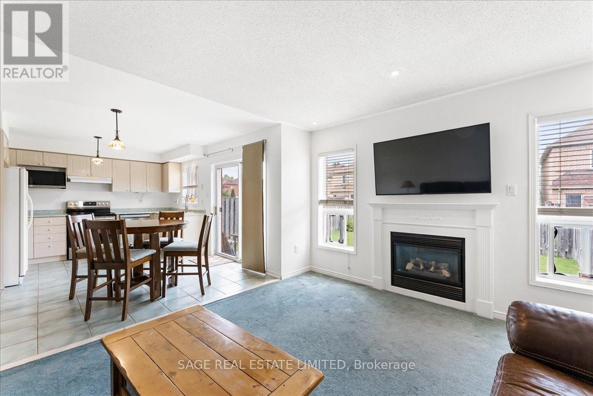 34 Mcsweeney Crescent, Ajax, ON - Indoor Photo Showing Living Room With Fireplace