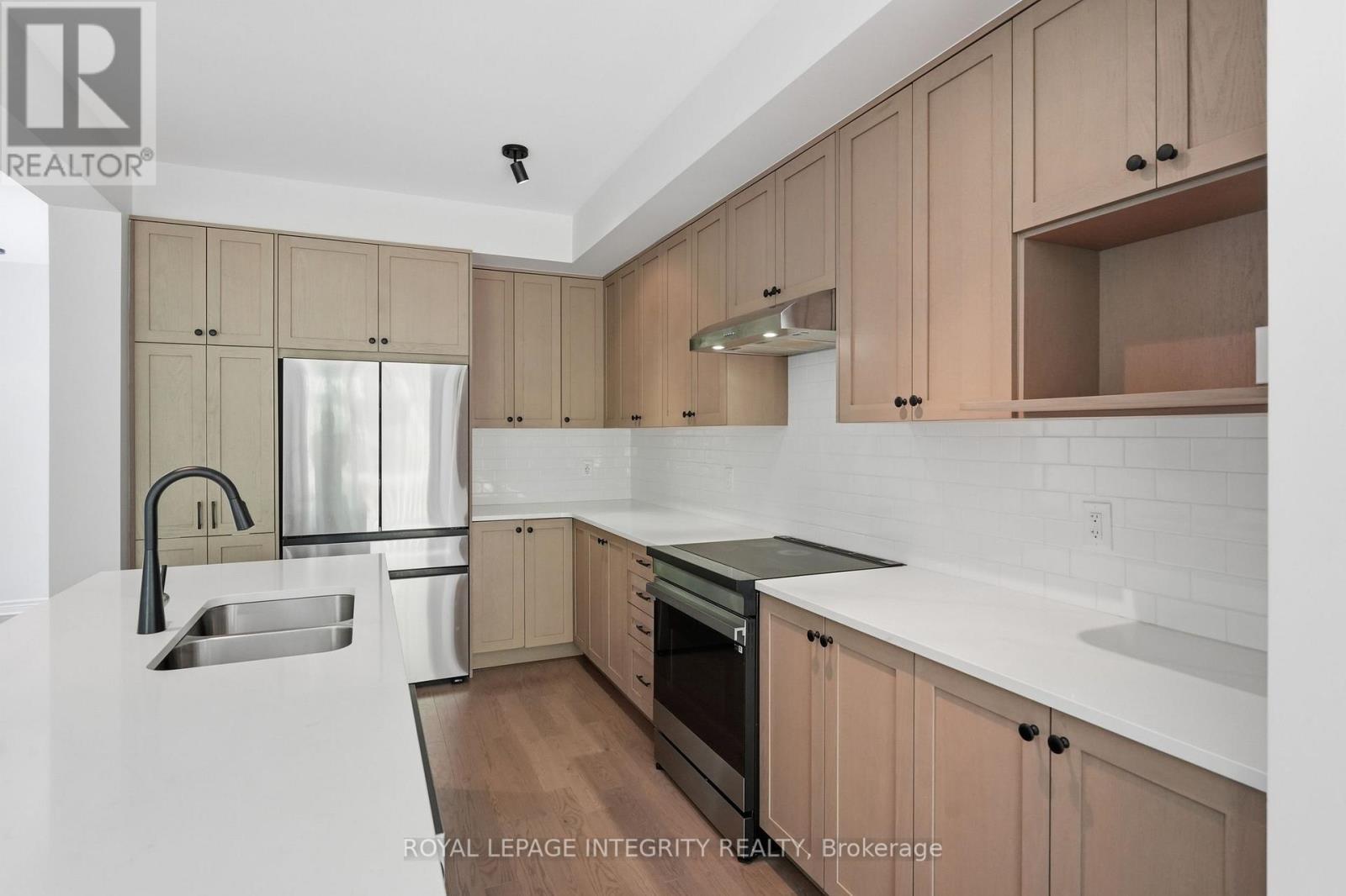 14 Academie Street, Russell, ON - Indoor Photo Showing Kitchen With Double Sink