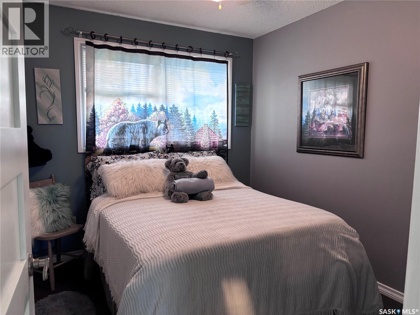 220 4Th Street, Dalmeny, SK - Indoor Photo Showing Bedroom