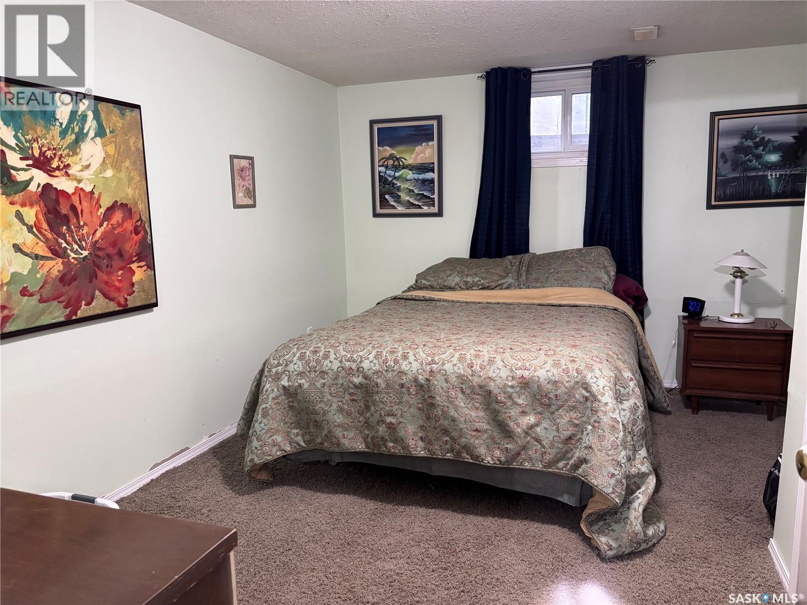 220 4Th Street, Dalmeny, SK - Indoor Photo Showing Bedroom