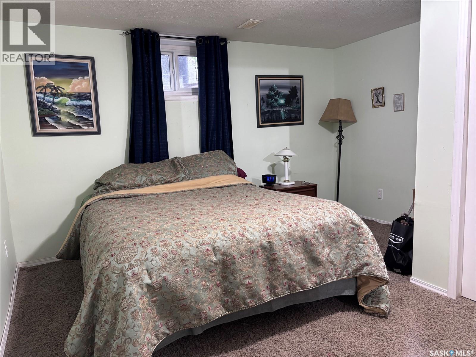 220 4Th Street, Dalmeny, SK - Indoor Photo Showing Bedroom