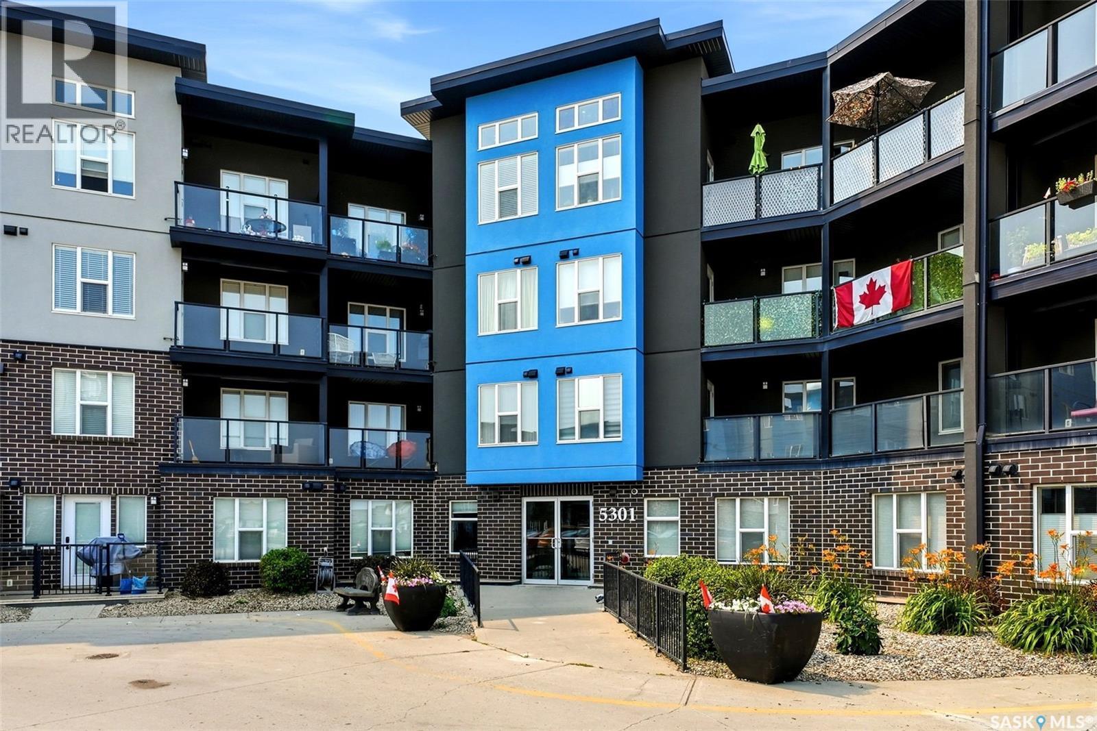 212 5301 Universal Crescent, Regina, SK - Outdoor With Balcony With Facade