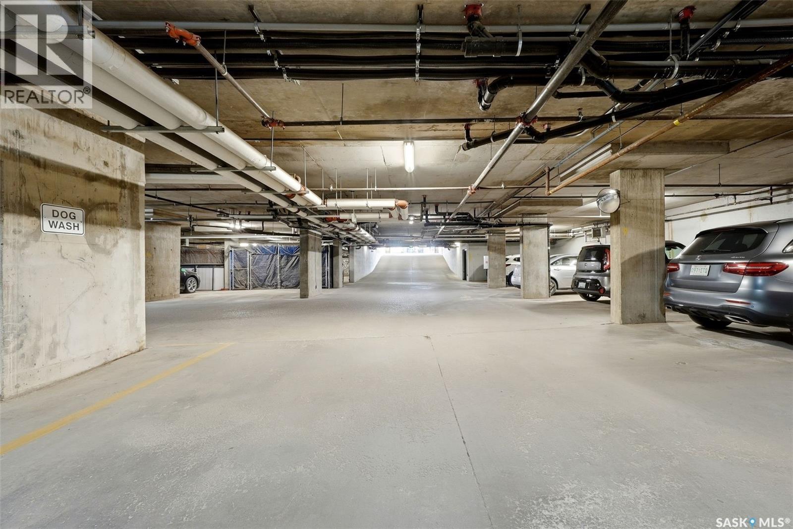 212 5301 Universal Crescent, Regina, SK - Indoor Photo Showing Garage