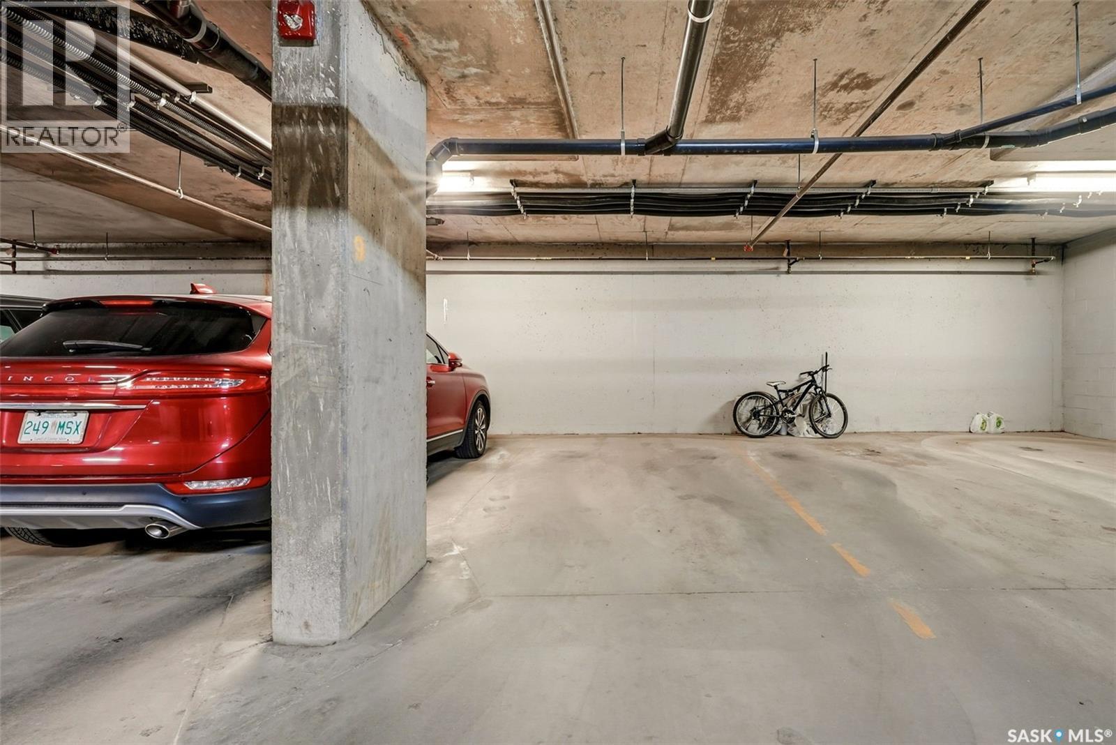 212 5301 Universal Crescent, Regina, SK - Indoor Photo Showing Garage
