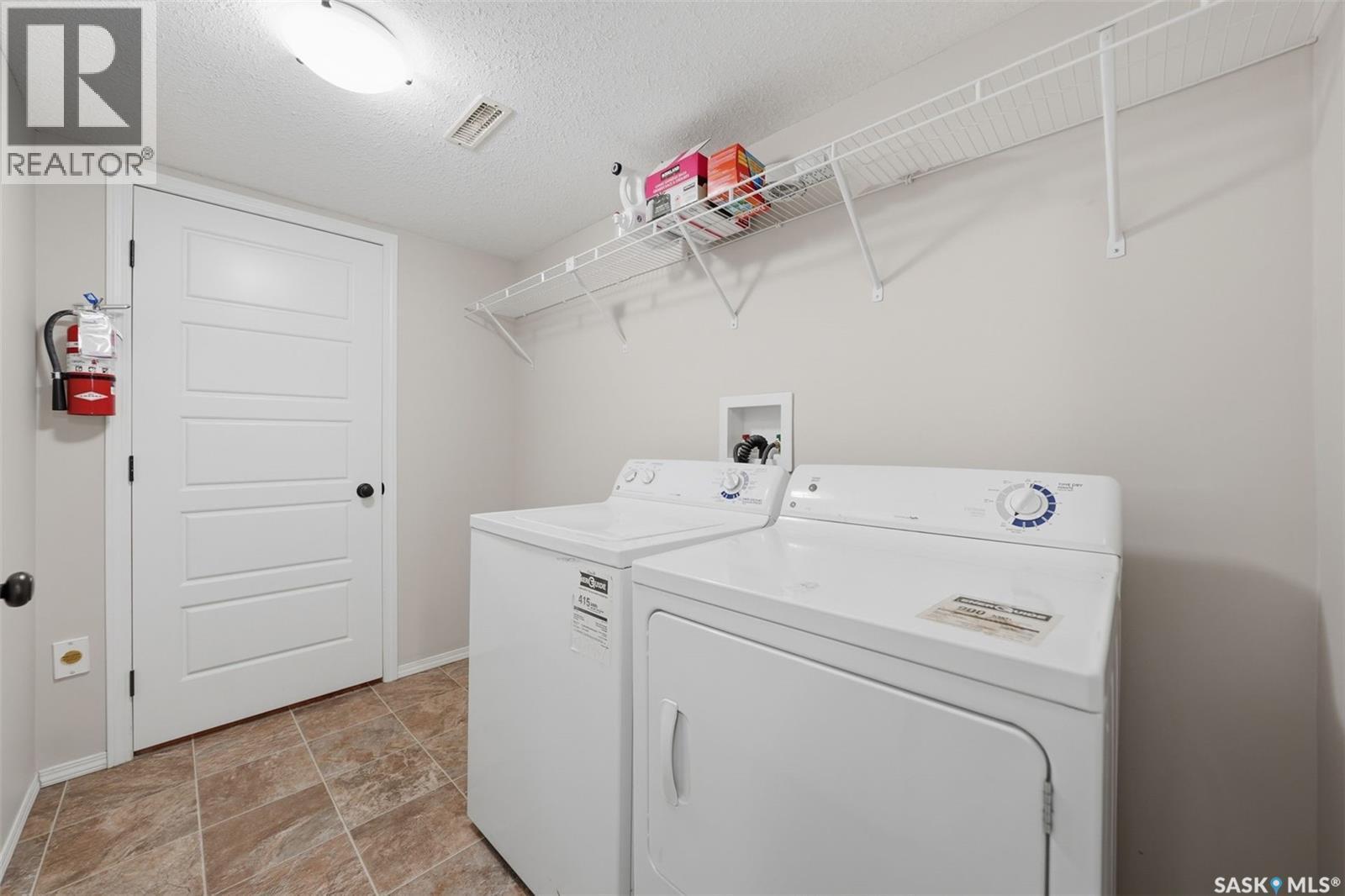 507 150 Langlois Way, Saskatoon, SK - Indoor Photo Showing Laundry Room