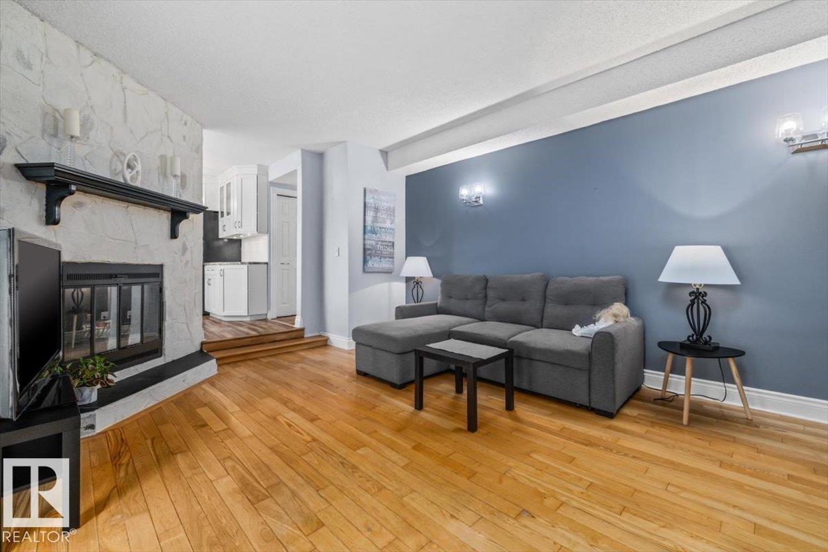 16551 116 St Nw, Edmonton, AB - Indoor Photo Showing Living Room With Fireplace