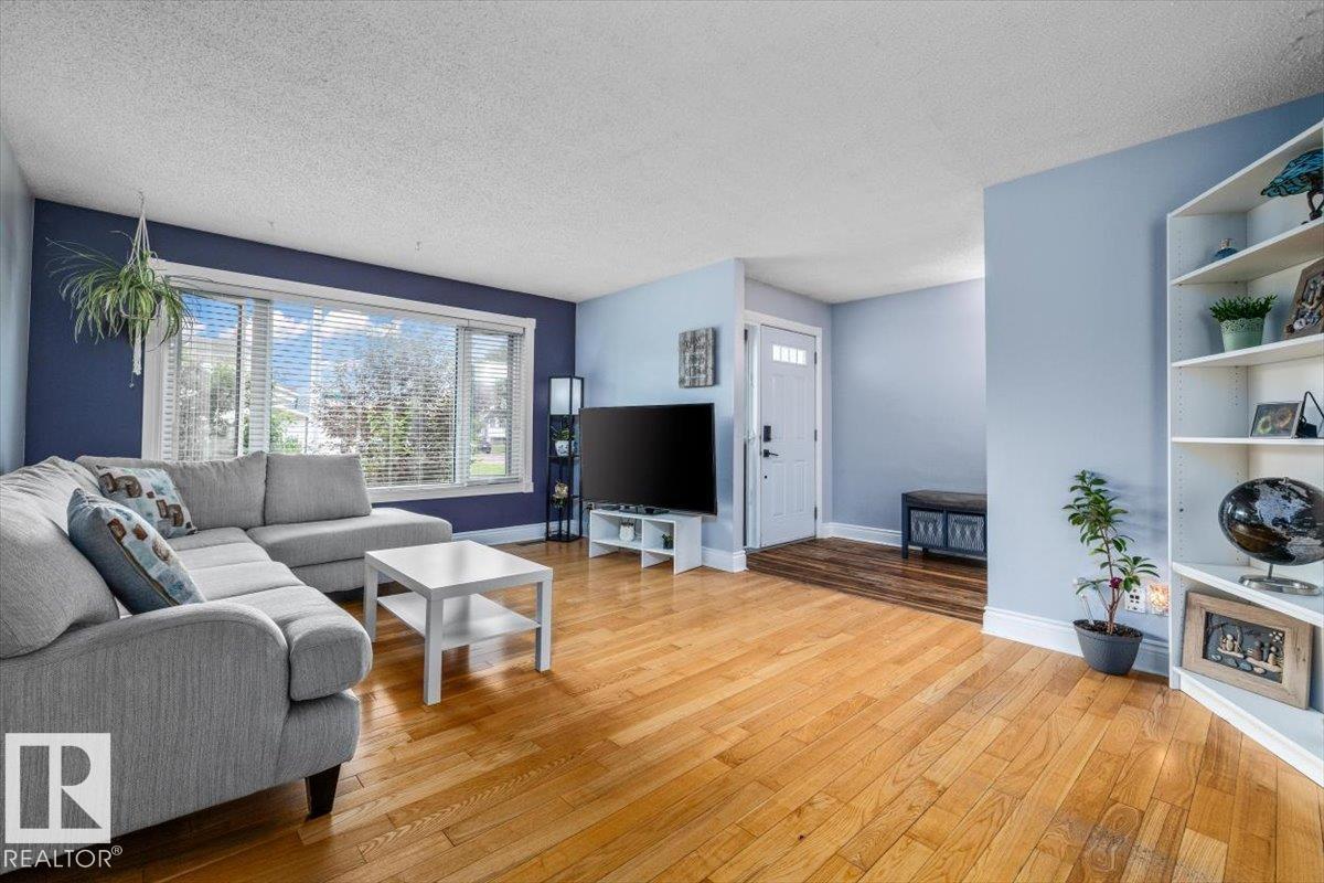 16551 116 St Nw, Edmonton, AB - Indoor Photo Showing Living Room With Fireplace