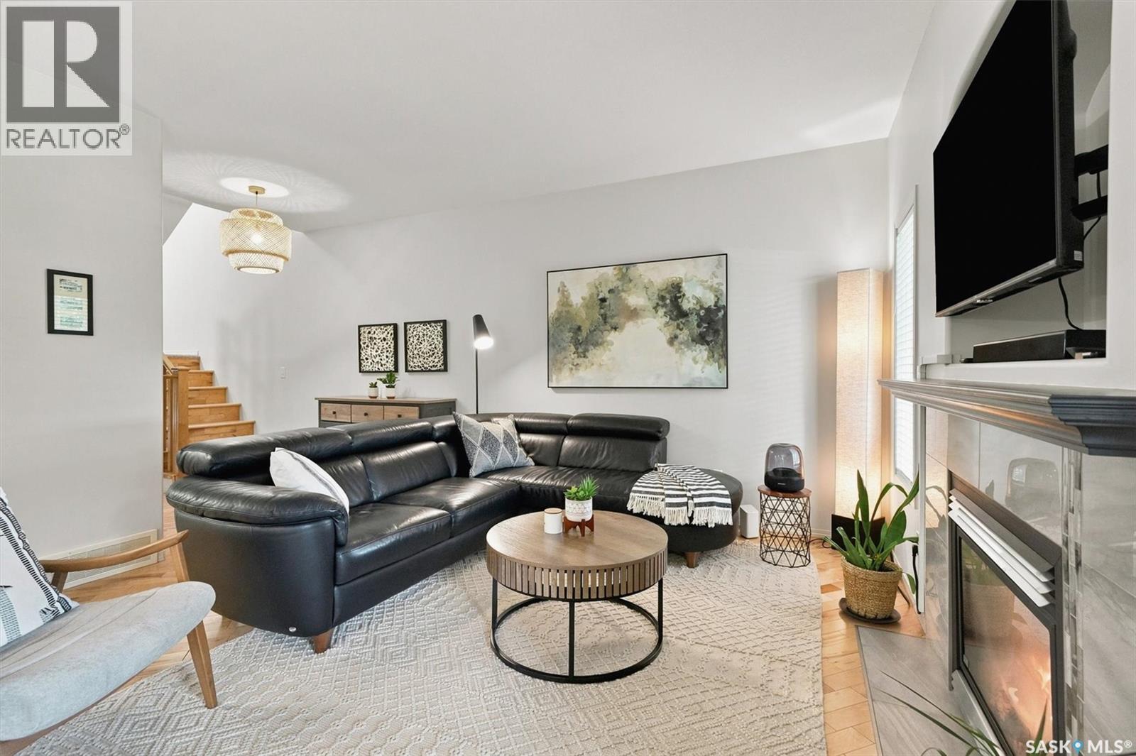 111 655 Kenderdine Road, Saskatoon, SK - Indoor Photo Showing Living Room With Fireplace