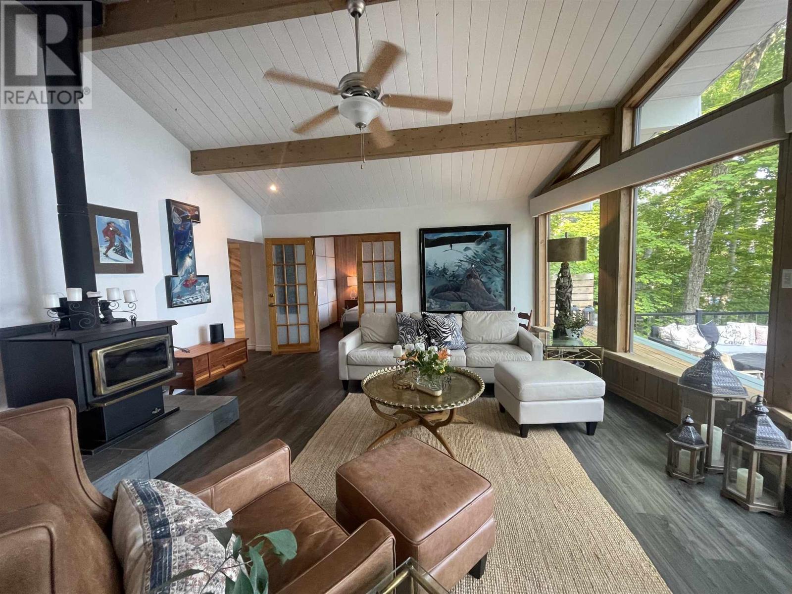 3173 Haight Rd, Hilton Beach, ON - Indoor Photo Showing Living Room With Fireplace