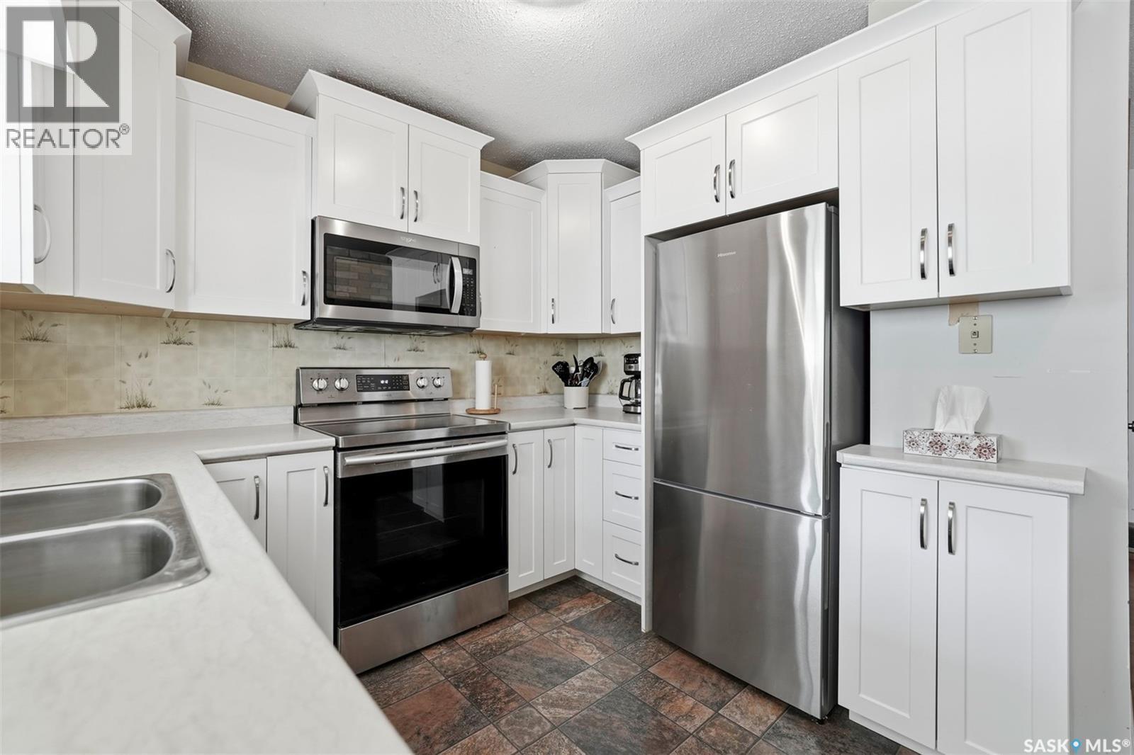 29 Macdowall Crescent, Prince Albert, SK - Indoor Photo Showing Kitchen With Stainless Steel Kitchen With Double Sink