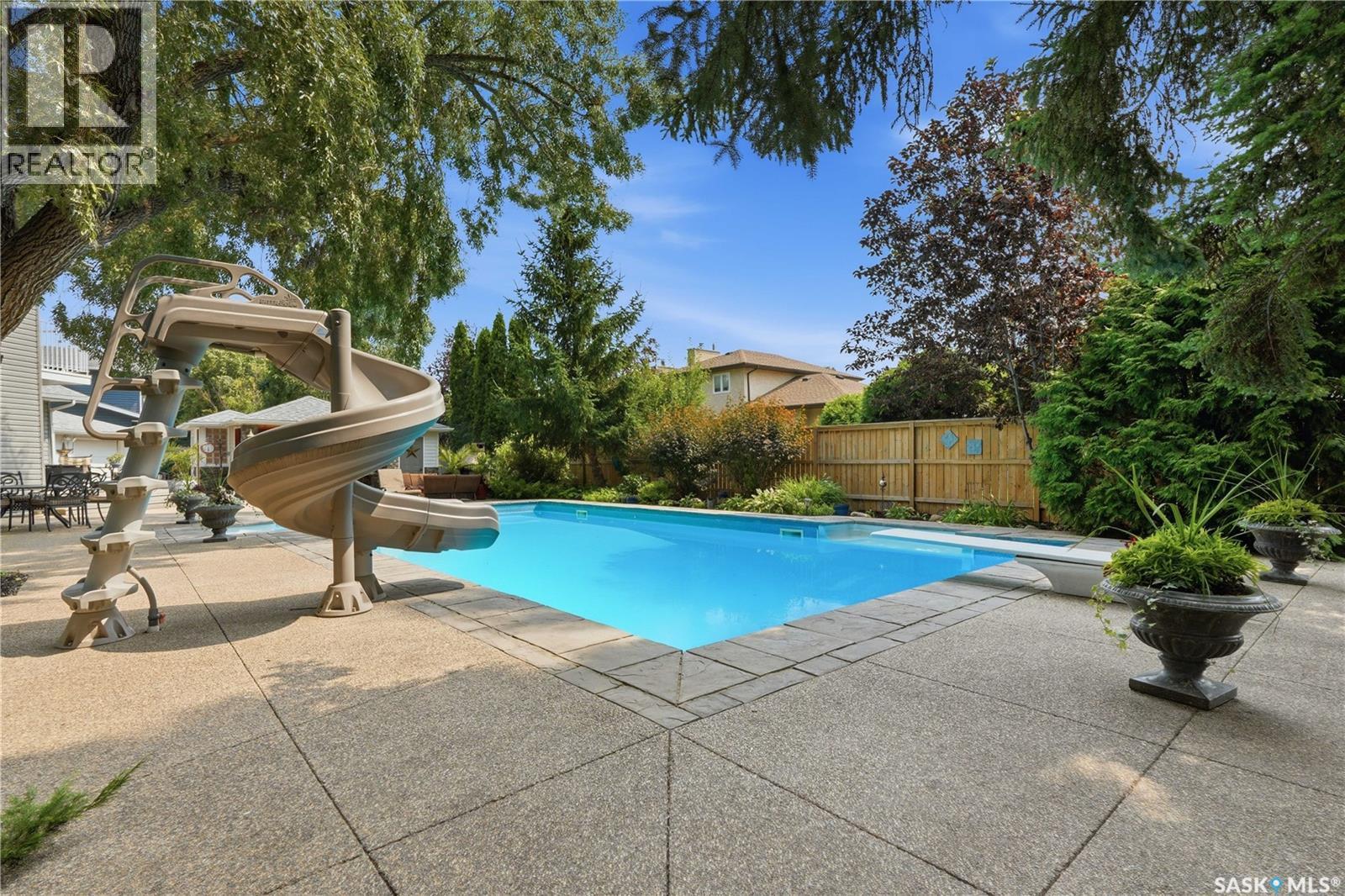 431 Rogers Court, Saskatoon, SK - Outdoor With In Ground Pool With Backyard
