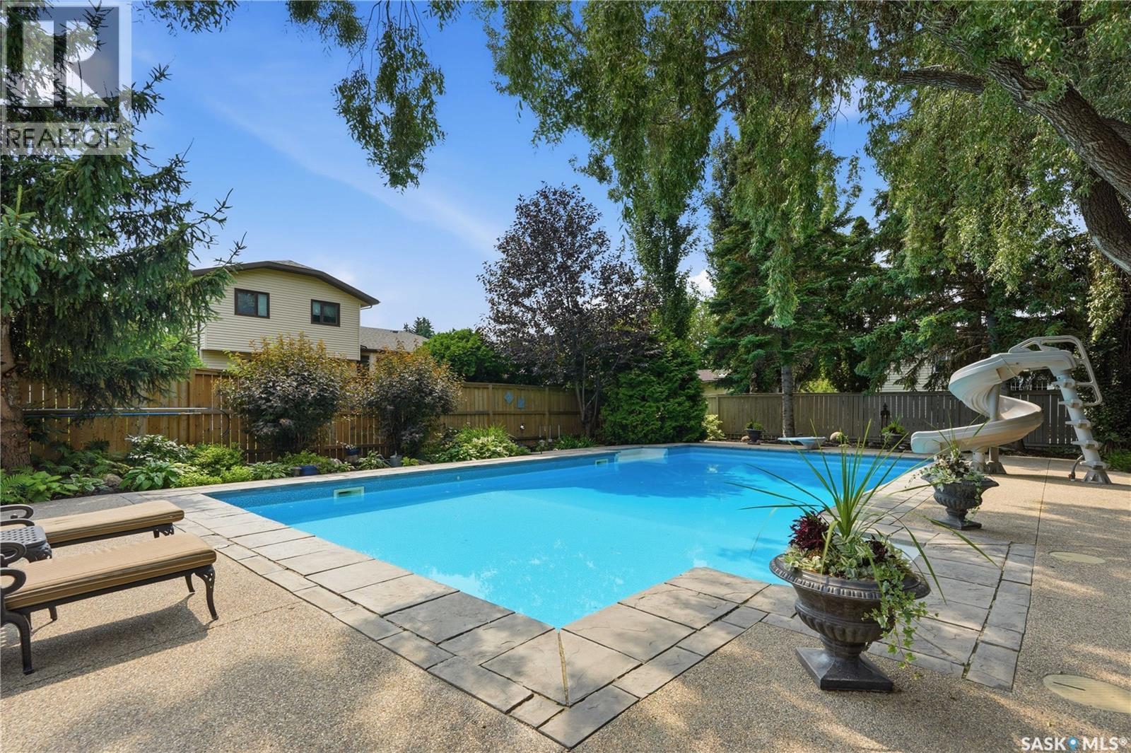 431 Rogers Court, Saskatoon, SK - Outdoor With In Ground Pool With Backyard