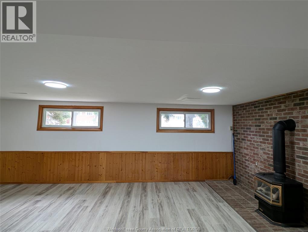 1867 Kent, Windsor, ON - Indoor Photo Showing Basement With Fireplace