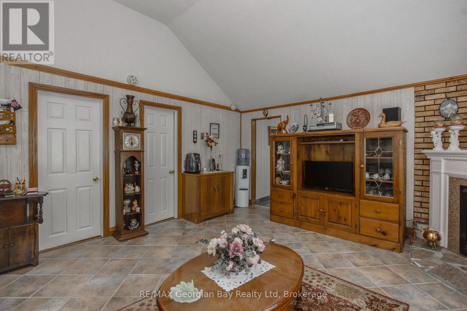 3 Brookside Drive, Tiny, ON - Indoor Photo Showing Other Room With Fireplace
