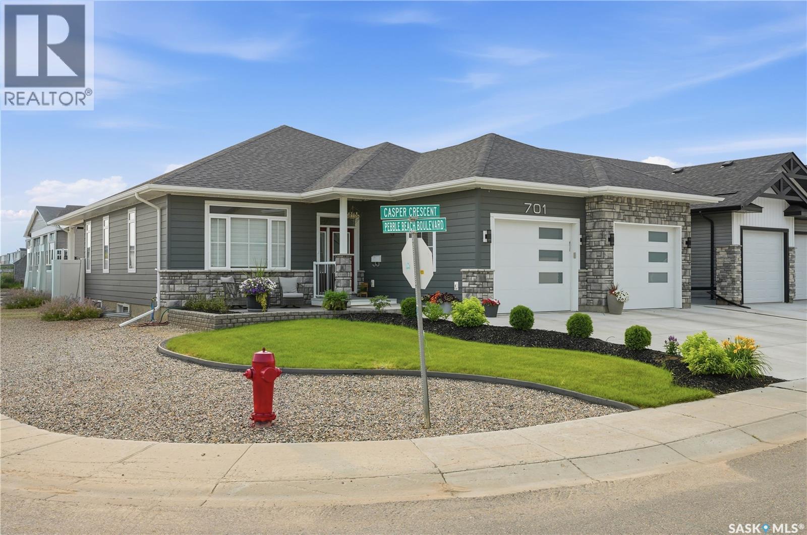 701 Casper Crescent, Warman, SK - Outdoor With Facade