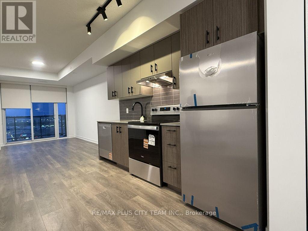C706 - 4878 Powers Common, Burlington, ON - Indoor Photo Showing Kitchen With Stainless Steel Kitchen
