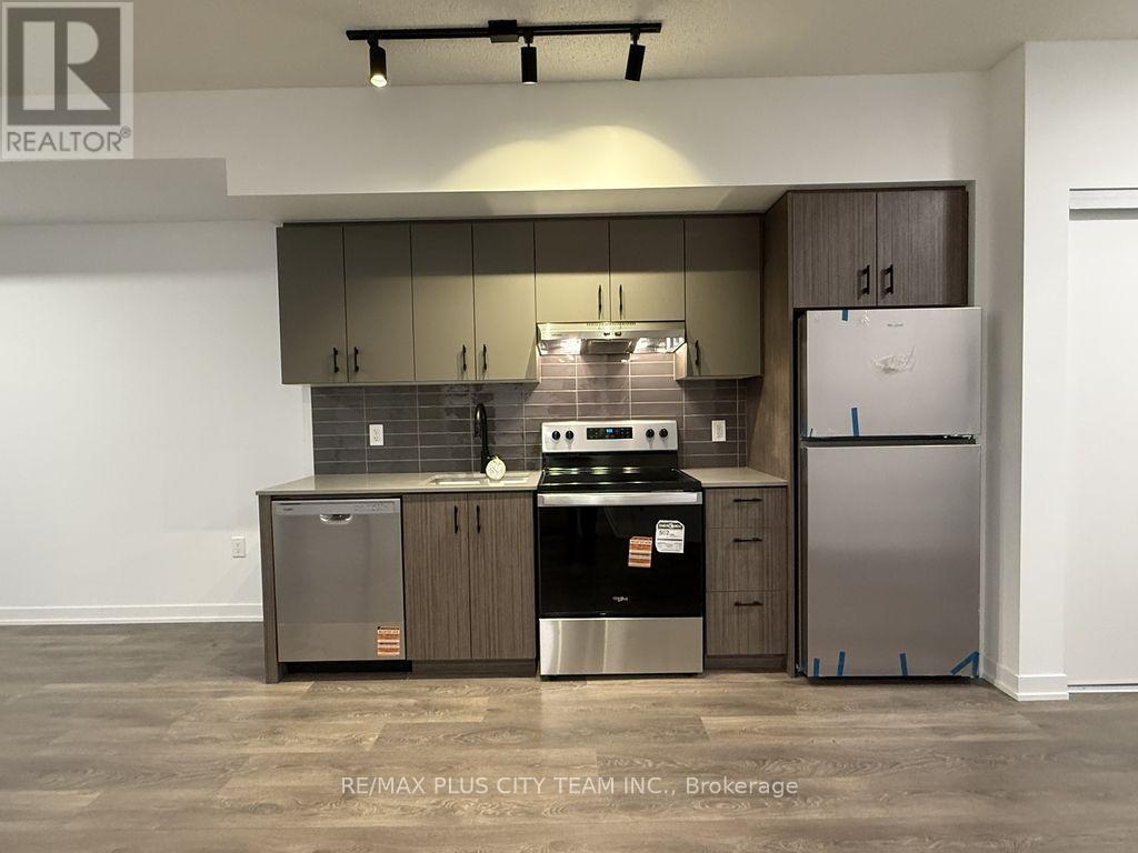 C706 - 4878 Powers Common, Burlington, ON - Indoor Photo Showing Kitchen With Stainless Steel Kitchen