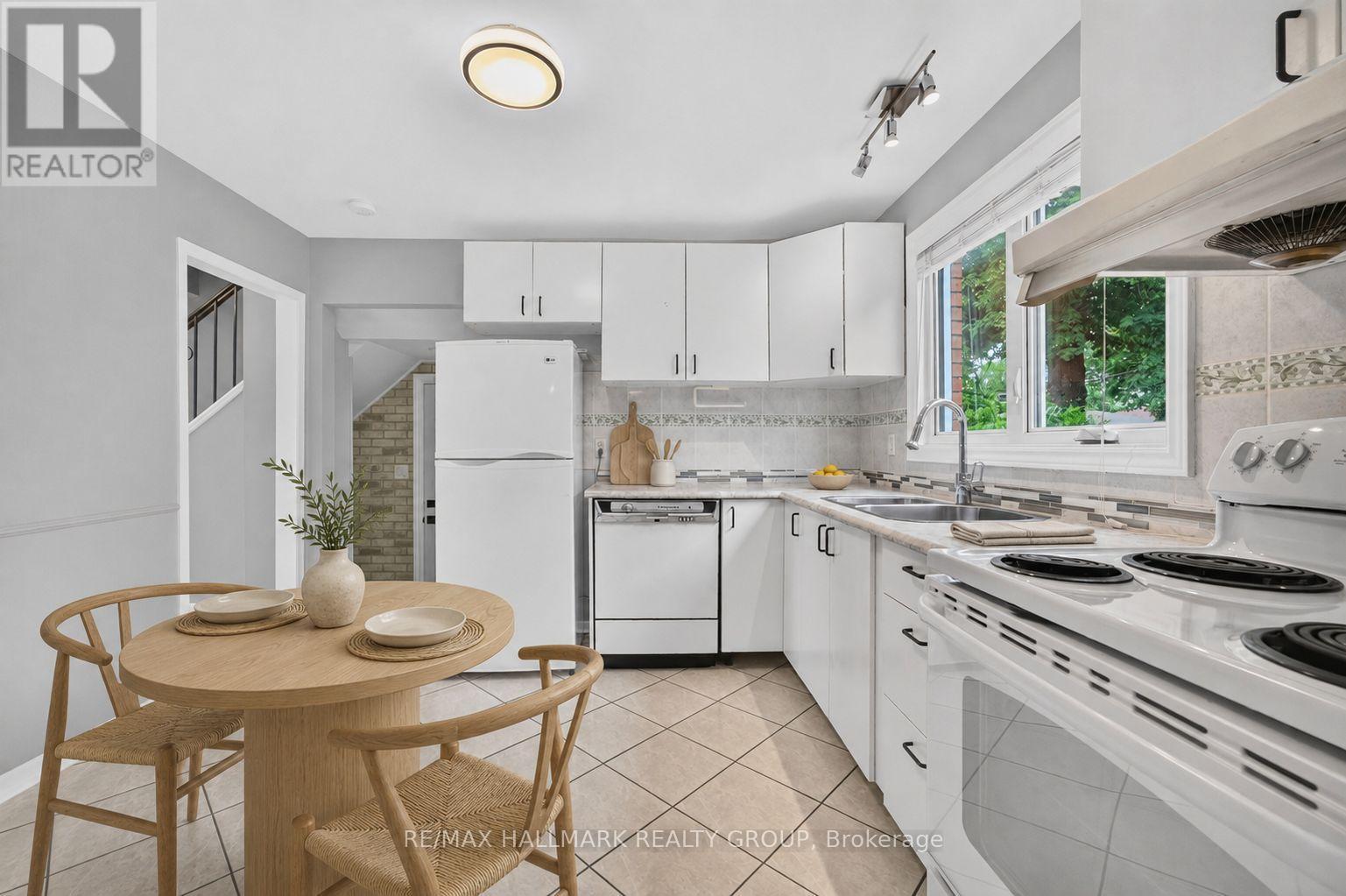 323 Poulin Avenue, Ottawa, ON - Indoor Photo Showing Kitchen With Double Sink