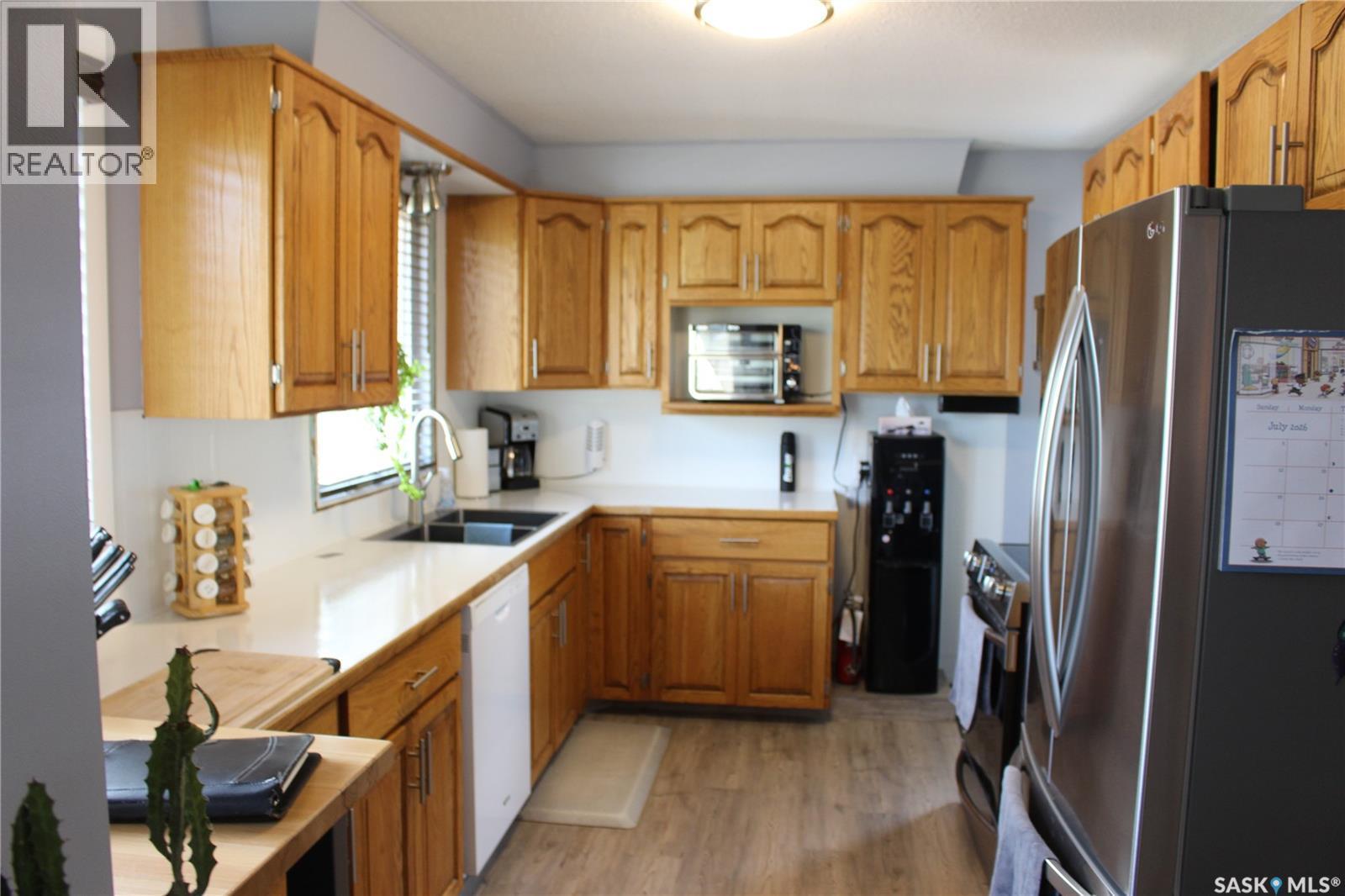 265 Saskatchewan Street, Central Butte, SK - Indoor Photo Showing Kitchen With Double Sink