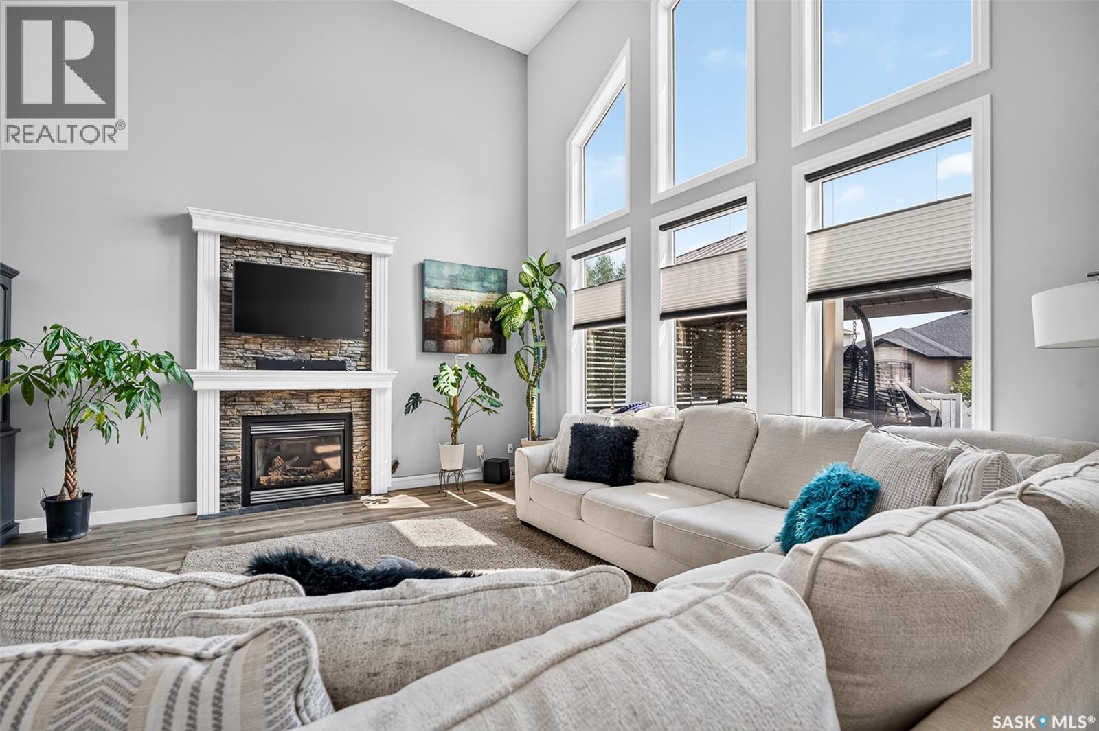 69 Goldenglow Drive, Moose Jaw, SK - Indoor Photo Showing Living Room With Fireplace
