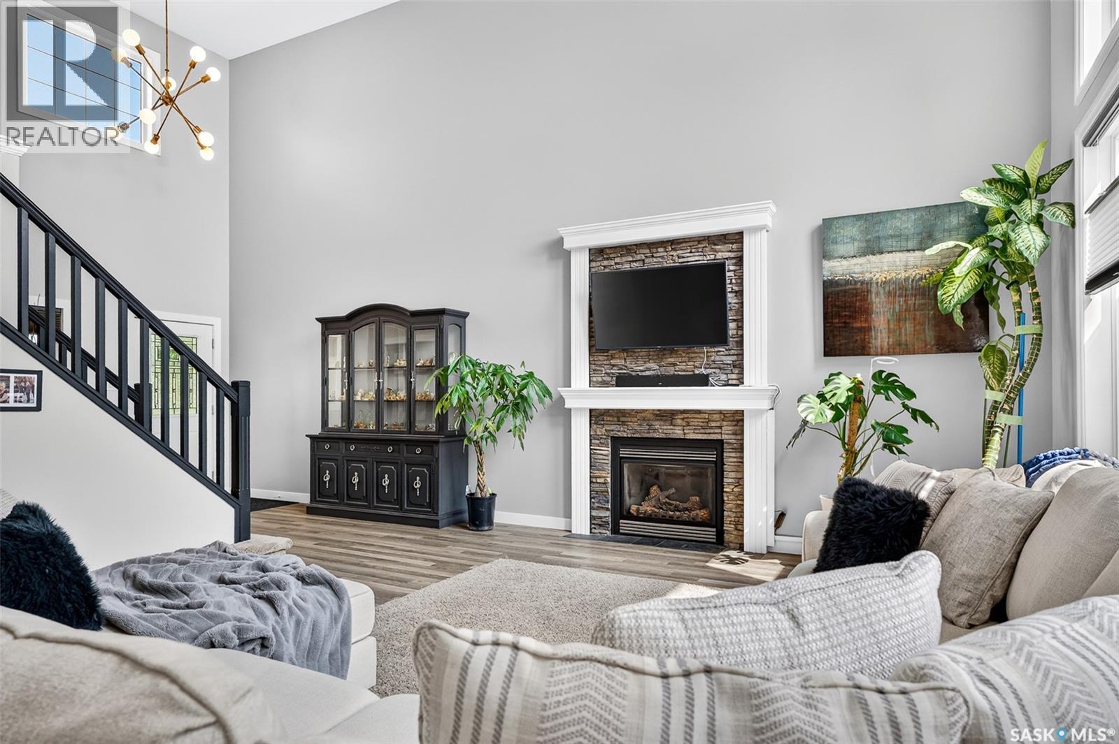 69 Goldenglow Drive, Moose Jaw, SK - Indoor Photo Showing Living Room With Fireplace